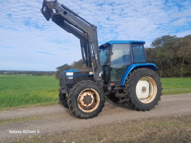 Ford New Holland 7740 SL DP med Ålø 950 frontlæsser