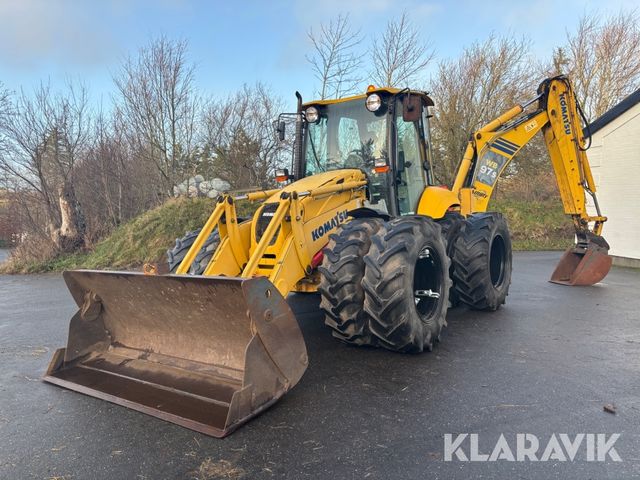 Komatsu WB97S-5 med tvillingehjul og tilbehør