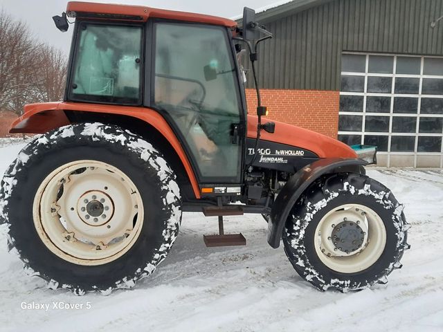 New Holland TL 100 40 kmt.