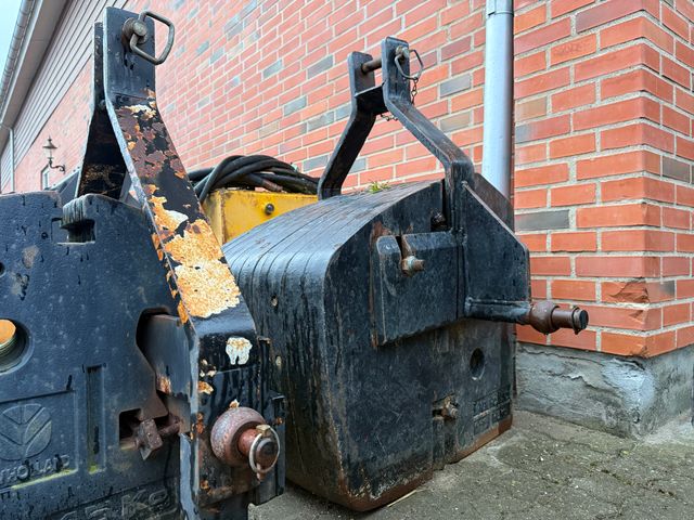 New Holland 10x 110 kg.