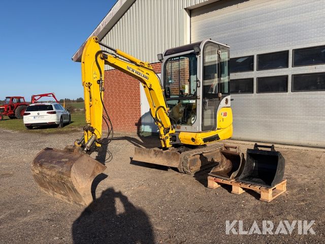 New Holland E18C med tiltman og skovlpakke